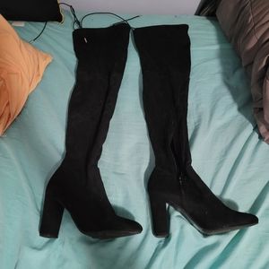 Thigh-high black heels